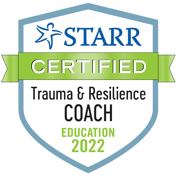 2021 Certified Trauma & Resilience Coach badge - shield shape with green certification ribbon across the front